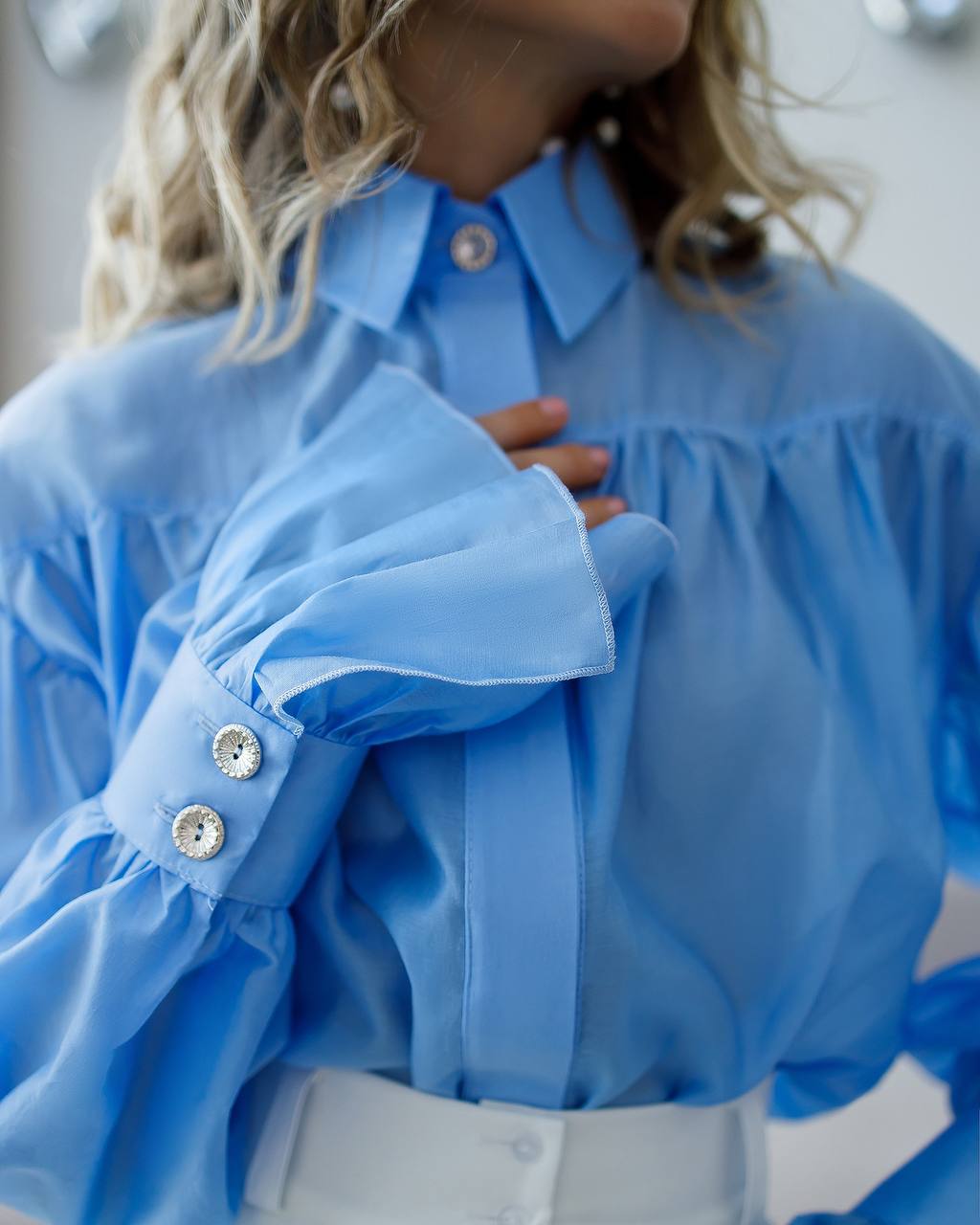 Sheer blouse with cuffs