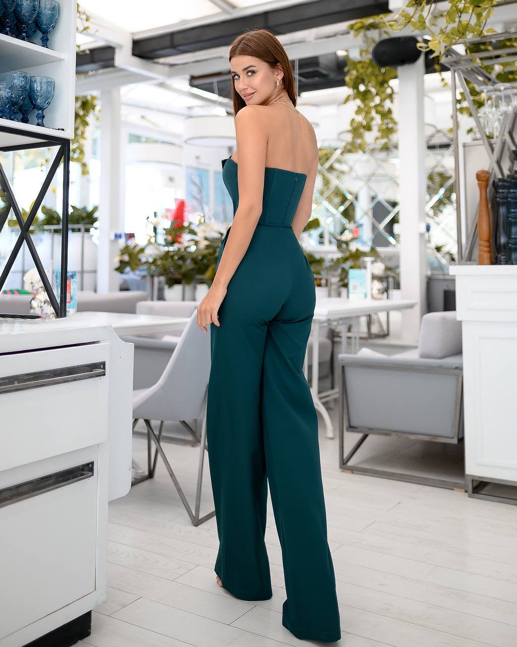 Smaragdgrüner Korsett- und Flare-Hosen-Jumpsuit
