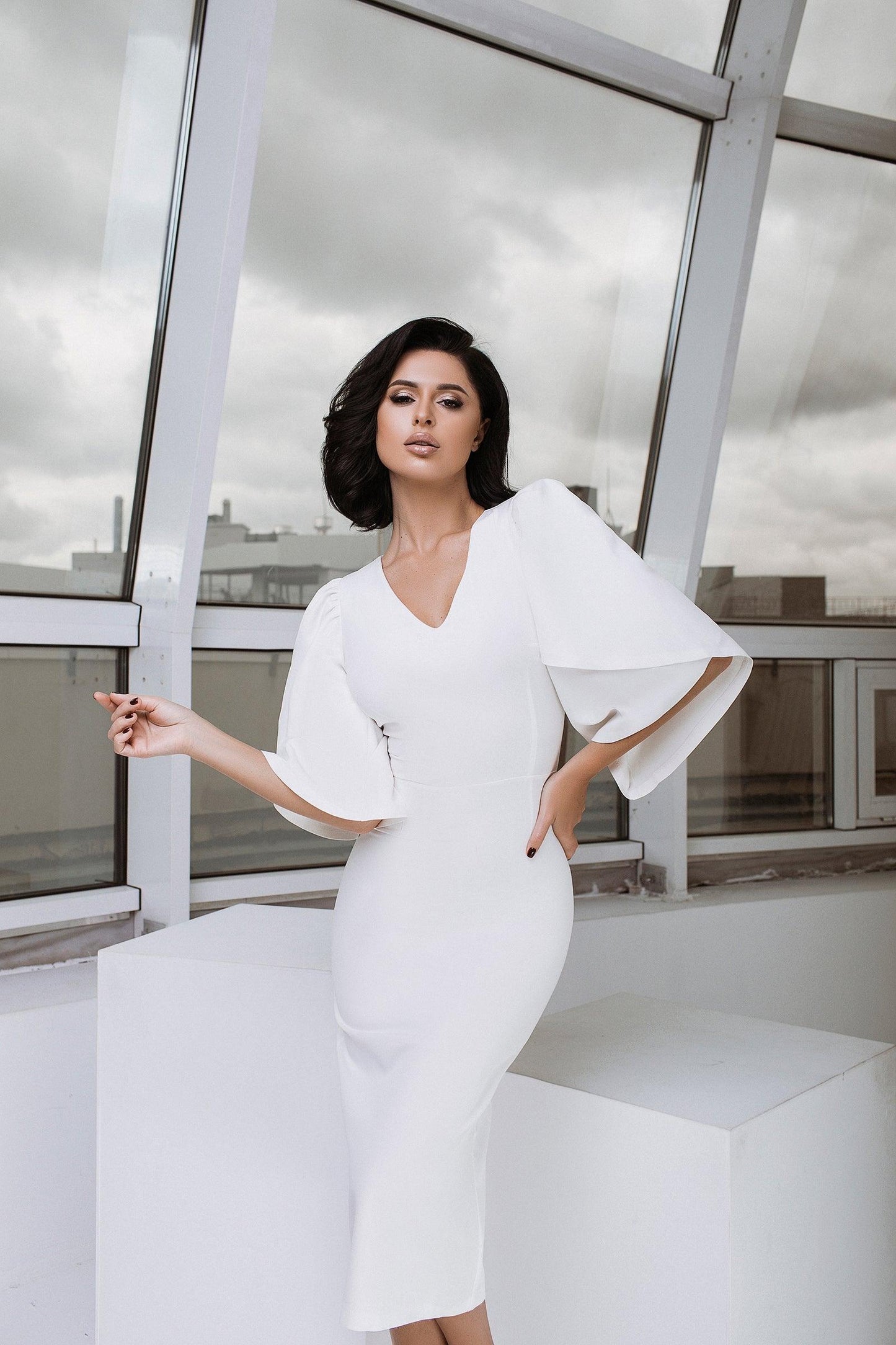 trinarosh White V-Neck Bell Sleeve Midi Dress