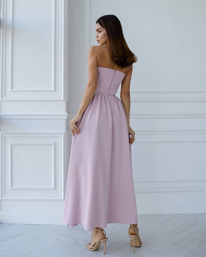 a woman in a strapless pink dress
